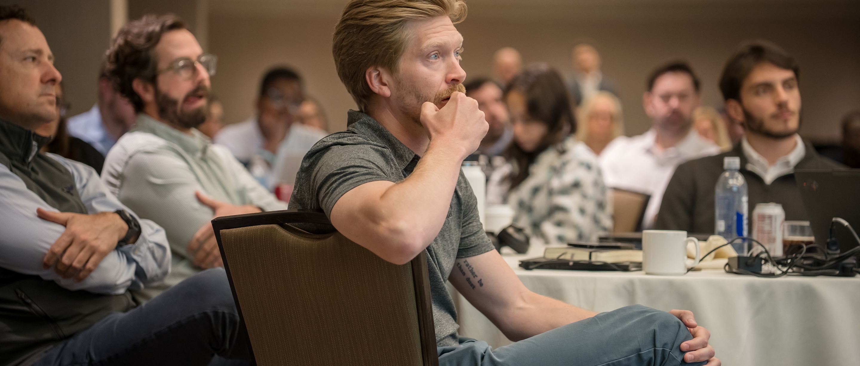 Lydian team members participating in a company workshop and discussion.